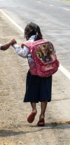 School Girls Running On A Road In Cambodia